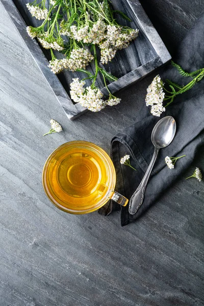 Medicinal herbal tea made from Yarrow, remedy for wound healing with copy space — Stock Photo, Image