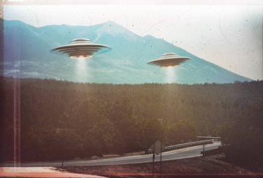 Unidentified flying object. Two UFOs flying over a road among the trees. 3D illustration retro photo vintage. Noise and defects of old photo film. clipart