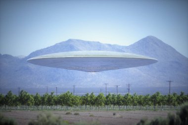 Tanımlanamayan uçan cisim, UFO, çöldeki tarlaların üzerinde uçuyor, arkasında dağlar var..