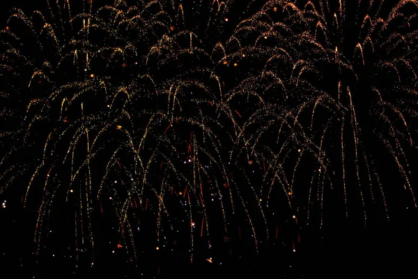 A festive salute illuminates the night sky. — Stock Photo, Image