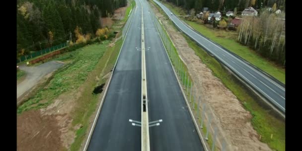 Aerial View Construction New High Speed Road Forest Parallel Operating — Stock Video