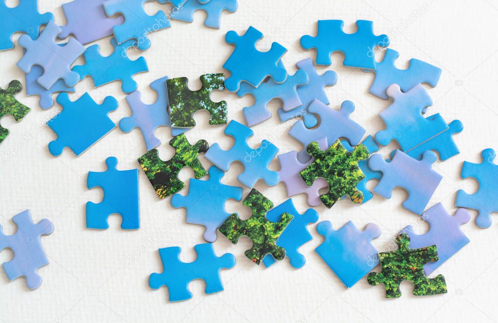 Blue and green puzzle elements