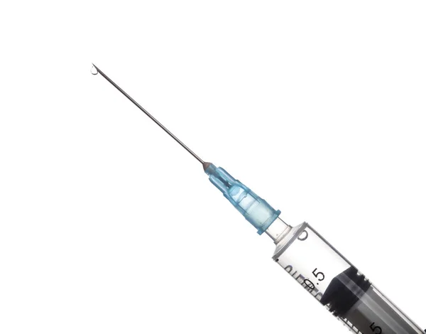 Syringe with an injection solution on white background with copy space — Stock Photo, Image
