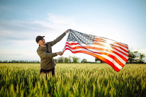 Young Man Wearing Green Shirt Cap Lets American Flag Fly — Stock Photo, Image