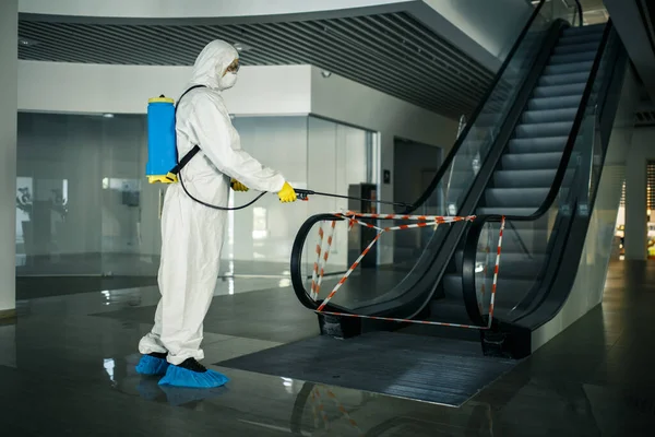Sanitizing Worker Disinfects Escalator Spray Empty Shopping Mall Prevent Covid — Stock Photo, Image