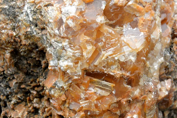 Closeup big honey-colored quartz druse — Stock Photo, Image