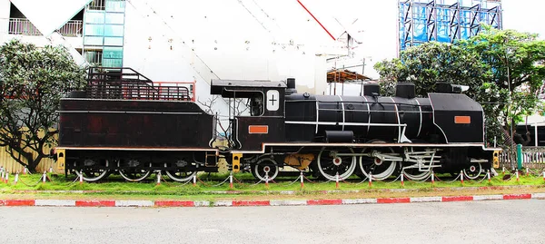 Vintage black steam train at station 2