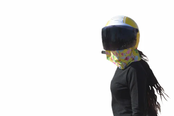 Chica joven en casco de motocicleta con vidrio, aislado Imágenes de stock libres de derechos