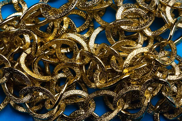 Golden Chain Blue Background Copy Space One — Stock Photo, Image