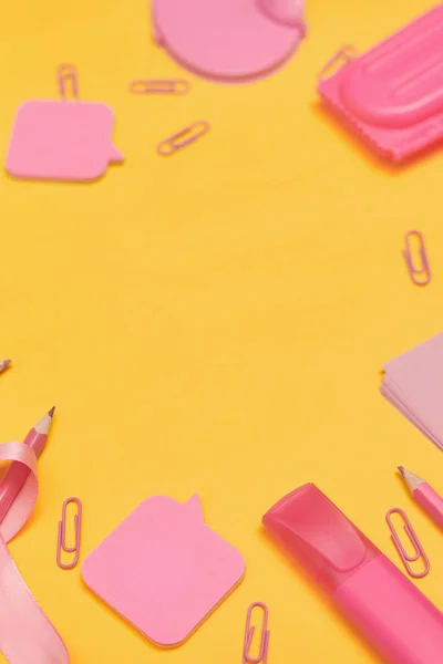 Minimalism, Back to school concept, Pink school supply on yellow background, flat lay copy space — 스톡 사진