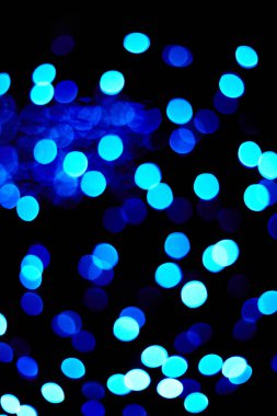 Siyah arka planda Noel Bokeh mavisi