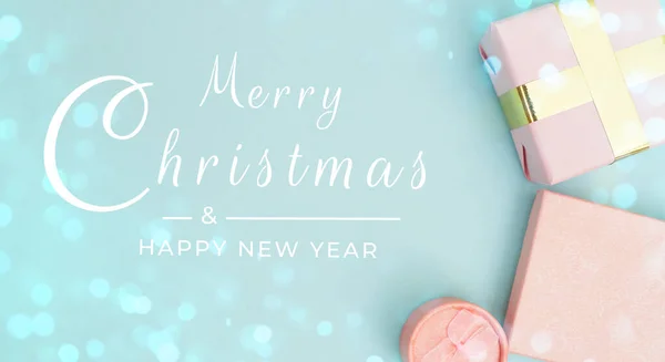 Banner, Merry Christmas composition, gifts on pastel blue background