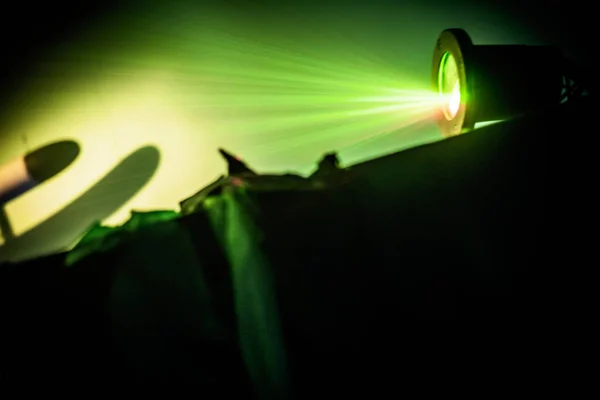 Laser Light show in the dark with bright green rays — Stock Photo, Image