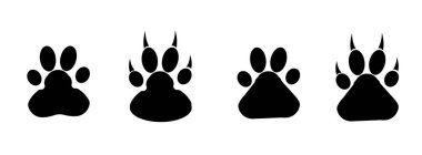 Beyaz arka planda izole edilmiş, farklı hayvanların ayak izlerinden oluşan siyah bir demet.