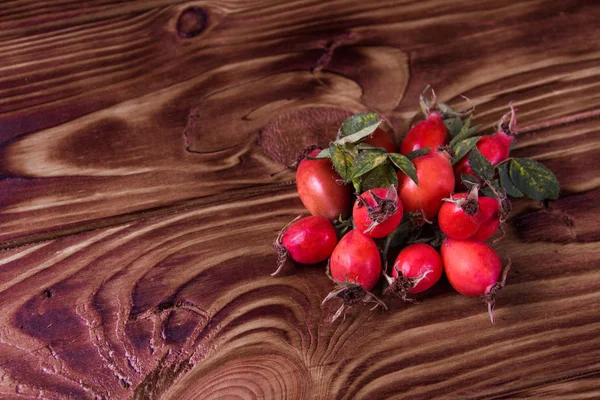 Rose Hip Wooden Background — Stock Photo, Image