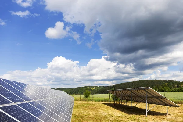 Detail of the Solar Power Panel with cloudy Sky