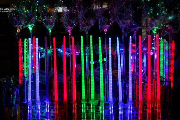 Colourful Red Green Purple Illuminated Toy Swords Sparkling Led Light — Stock Photo, Image