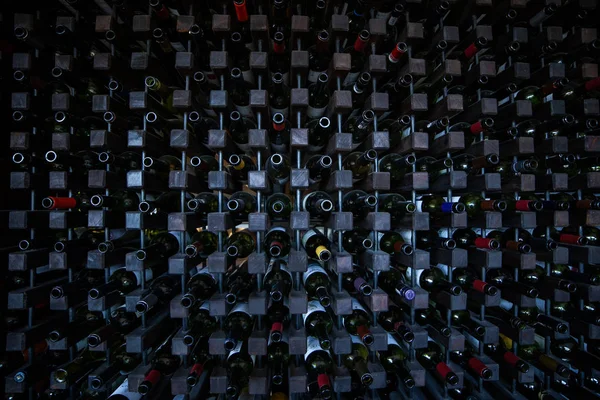 Fish eye shot of bottles in wine cellar