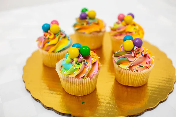 Sweet bubblegum cupcakes in white background