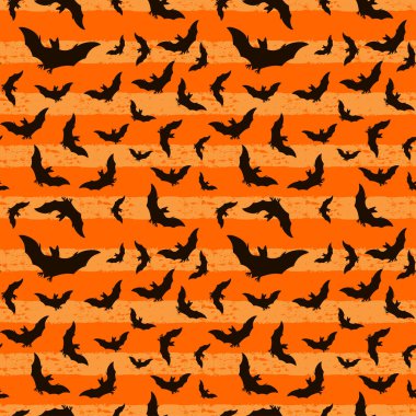 Turuncu çizgili arka plan üzerinde yarasalar siyah siluetler ile Dikişsiz desen 
