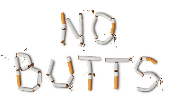 Texte "no butts" fabriqué à partir de cigarettes cassées — Photo