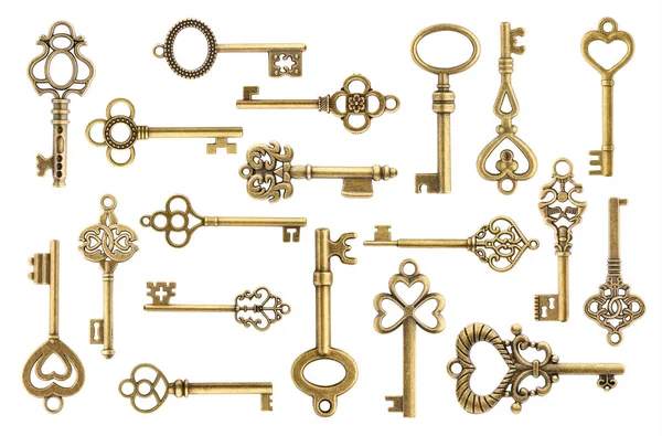 Set of vintage golden skeleton keys isolated on white background — Stock Photo, Image