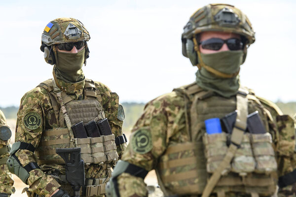  Ukrainian servicemen during the tactical-special drills of the Ministry of Internal Affairs on the shooting range in the village of Stare, Ukraine. 