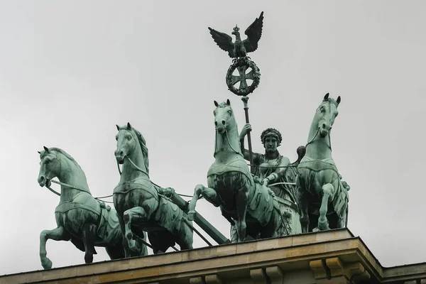 Bronze Quadriga chariot on top of the Brandenburg Gate Tor in Berlin, Germany. Stock Picture