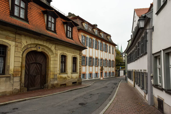 Narrow medieval street with traditional Bavarian houses in Bamberg, Bavaria, Franconia, Germany. November 2014. High quality photo
