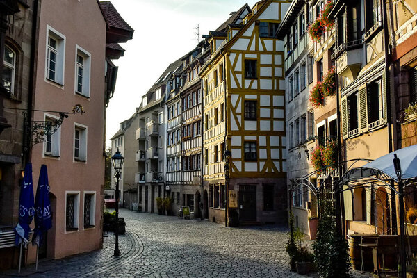 Old fachwerk half-timbered houses on Weissgerbergasse street in the historical center of Nuremberg, Germany. October 2014. High quality photo