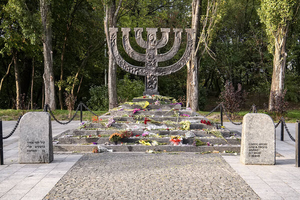 Menorah monument in Memory of Jews Victims at the Babyn Yar National Historical Memorial. October 2020 Kyiv, Ukraine. . High quality photo