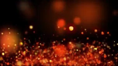 Soyut parlak turuncu glitter parçacıkları. Ateş bokeh. Parlayan bokeh ışıltıları ile soyut arka plan. Işın ışığı.