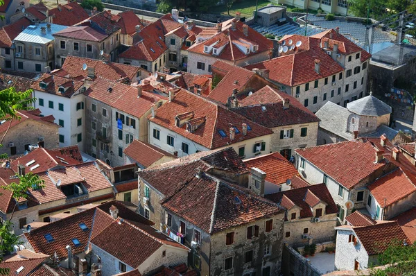 Old red tile roof tops in coastal town Kotor in Montenegro.