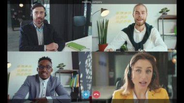 İş arkadaşlarıyla video görüşmesi yapmak için video konferans teknolojisini kullanan bir grup. Teknoloji bağlantısı, web kamerası yaşam tarzı, canlı web ekran koronavirüsü yavaş çekim sohbeti.