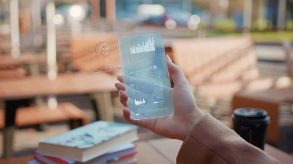Future Vertical Smartphone. Business Background. The Woman Use Smartphone with Futuristic Design. Multimedia Technology. Concept of Digital Future. Augmented Reality. Technology of Holographic