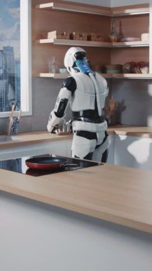 Zarif bir insansı robot ileri teknoloji aletlerle dolu bir mutfakta ustalıkla görevler yapıyor.
