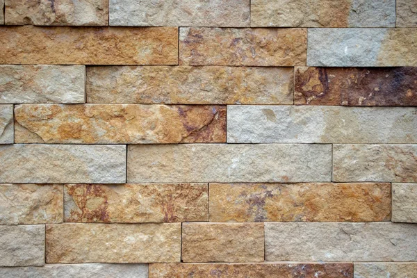 sarı kabartmalı kumtaşı duvar