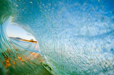 Inside out vision of a barreling wave at Campeche beach in Florianpolis Brazil clipart