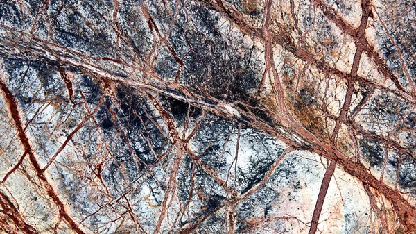 Taş arka plan doku. dekoratif doğal arka plan. karmaşık çok renkli desen taş. arka plan