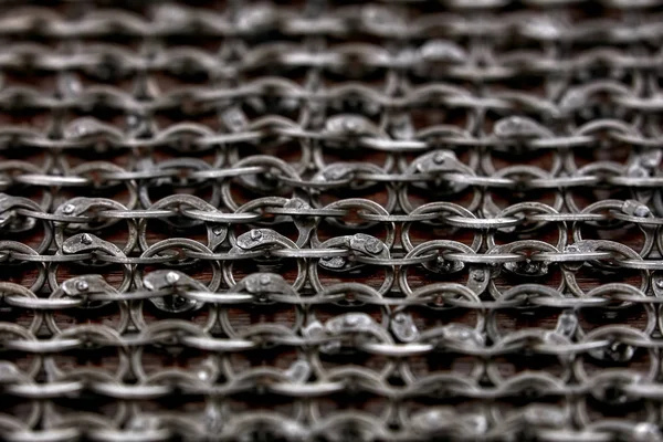 Chain-mail or Hauberk texture, metal protective armor of medieval or middle ages times.