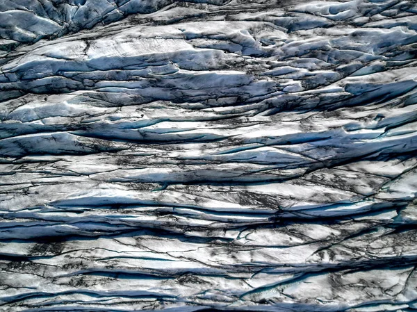 Flygbild av glaciär ovanifrån, is och aska från vulkanen — Stockfoto