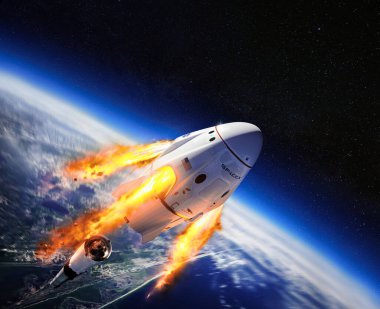 Uzaydaki SpaceX adlı özel Amerikan şirketinin mürettebat Dragon uzay aracı. Dragon, Dünya yörüngesine ve ötesine 7 kadar yolcu taşıma kapasitesine sahiptir. Bu görüntünün elementleri NASA tarafından desteklenmektedir.