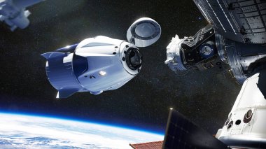 SpaceX mürettebatı Dragon uzay aracı Uluslararası Uzay İstasyonu 'na yanaşıyor. Dragon, Dünya yörüngesine ve ötesine 7 kadar yolcu taşıma kapasitesine sahiptir. Bu görüntünün elementleri NASA tarafından desteklenmektedir