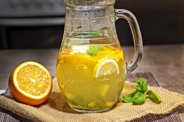 Glass Jug Water Honey Lemon Slices Mint Leaves Ginger Orange — Stock Photo, Image