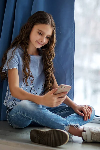 Portrait Caucasian Teenage Girl Sitting Window Mobile Phone Educational Concept — Stock Photo, Image