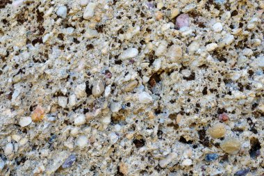 Taş bir duvarın dokusu. Eski kale taşından duvar dokusu. Bir taş duvarın parçası, arkaplan veya doku için.