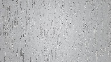 Gri dekoratif sıva veya beton doku. Tasarım için soyut arka plan. Duvarda dekoratif sıva etkisi.