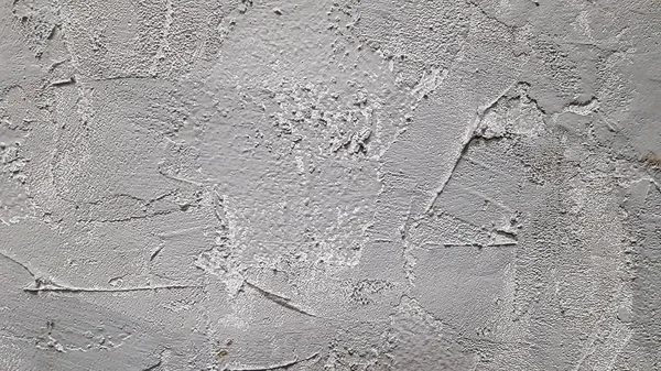 Texture of gray decorative plaster or concrete. Abstract background for design. Decorative plaster effect on wall.