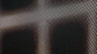 LCD ekran piksellerini kapat. Soyut arkaplan. Renk kodlu LED ekranını kapat. Bir film gösterilirken RGB pikselleri televizyonda. Kırmızı, mavi ve yeşil alt pikseller ekranda bir resim oluşturur