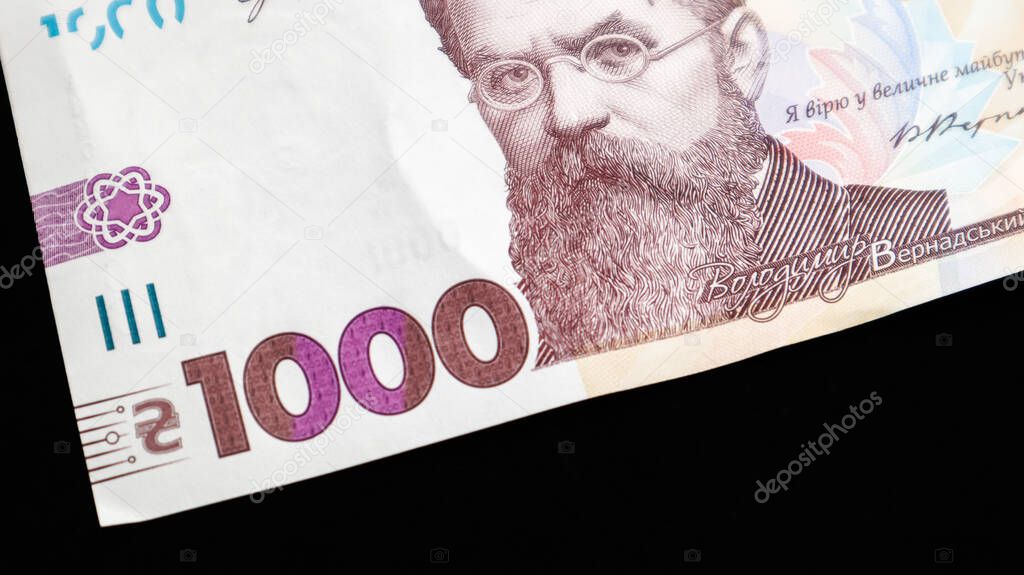 One paper note in 1000 hryvnias. Portrait of Vladimir Ivanovich Vernadsky for 1000 hryvnias on a Ukrainian banknote. Ukrainian money.